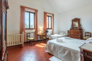 Ένα ή περισσότερα κρεβάτια σε δωμάτιο στο Fienile