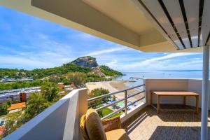 a balcony with a view of the beach at Beachfront 2 bed Condo with Seaview! - BW2 in Hua Hin
