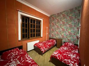 Postel nebo postele na pokoji v ubytování Backpackers Georgia