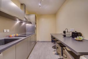 Cucina o angolo cottura di Le Richelieu - Magnifique duplex avec une vue Incroyable