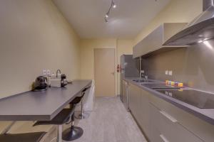 Cucina o angolo cottura di Le Richelieu - Magnifique duplex avec une vue Incroyable