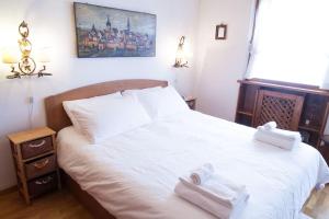 Ένα ή περισσότερα κρεβάτια σε δωμάτιο στο Verocai Studio by WelcHome