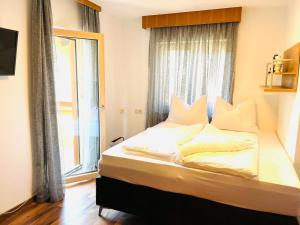 Postel nebo postele na pokoji v ubytování Maisonette Adelrun