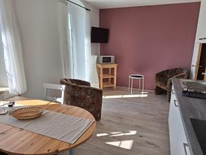 TV a/nebo společenská místnost v ubytování Hotel Heilbrunnen
