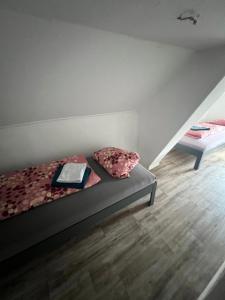 Postel nebo postele na pokoji v ubytování Pension und Monteurzimmer Schwarzer Adler
