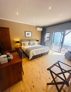 Postel nebo postele na pokoji v ubytování Vine Guesthouse + 37 fotografií