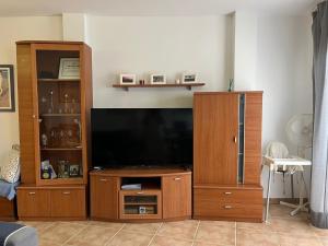 TV a/nebo společenská místnost v ubytování Casa El Almendrillo