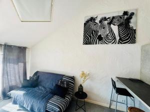 Ruang duduk di Le Zèbre Un Séjour à Part