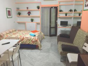 A bed or beds in a room at Estudio Las Huertas