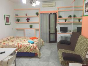 A bed or beds in a room at Estudio Las Huertas