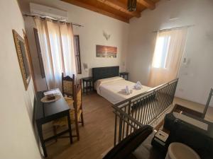 Voodi või voodid majutusasutuse Decadracma rooms toas
