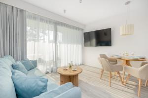 Un televizor și/sau centru de divertisment la Sea&Lake Studia z Parkingiem w Mielnie by Noclegi Renters