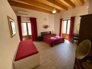Voodi või voodid majutusasutuse Decadracma rooms toas