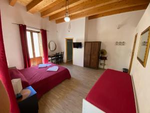 Voodi või voodid majutusasutuse Decadracma rooms toas