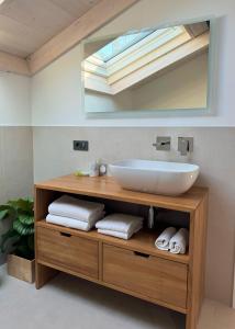 a bathroom with a sink and a mirror at Oasi di Mare - Boutique Guest House in Bordighera +27 photos