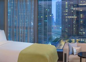 Cama o camas de una habitación en W Hong Kong
