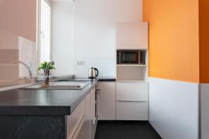 Kuchyňa alebo kuchynka v ubytovaní Esperanto Home