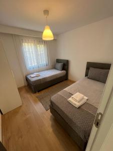 Postel nebo postele na pokoji v ubytování Villaant Adrasan
