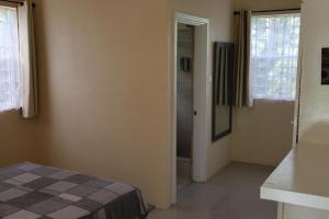 Letto o letti in una camera di My Gem in the Caribbean