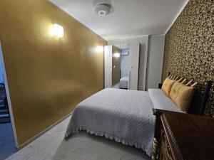 Ένα ή περισσότερα κρεβάτια σε δωμάτιο στο Exclusive Luxury Place