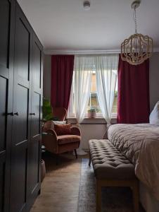 Postel nebo postele na pokoji v ubytování Wohnung mit direktem Seeblick + 24 fotografií