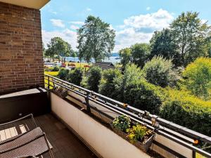 Balkón nebo terasa v ubytování Wohnung mit direktem Seeblick