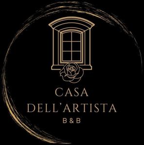 a black and gold logo with a window at La Casa Dell'Artista in Rossaza