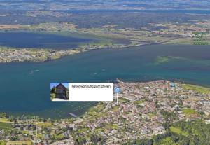 an aerial view of a lake and a city at Platz zum Wohlfühlen „cook&chill“ in Ermatingen