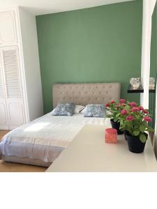 En eller flere senge i et værelse på TerracitoReggio Vari Appartamenti