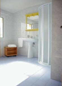 Koupelna v ubytování Hotel Garni Tosca