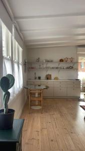 a room with a table and a chair in it at Captains Rest St Kilda West in Melbourne