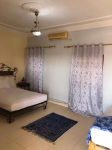 APPART AIGLE HOTEL客房内的一张或多张床位