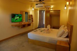 TV a/nebo společenská místnost v ubytování Relax Lodge