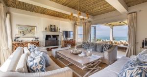 Posezení v ubytování Hideaways Mariners Moon, Plettenberg Bay