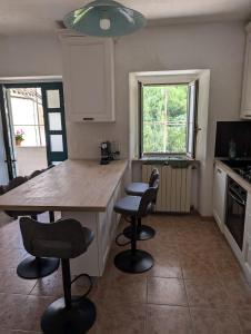 Kuchyň nebo kuchyňský kout v ubytování Maison individuelle Farindola santa maria