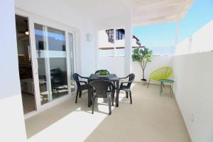 TV a/nebo společenská místnost v ubytování Deluxe Apartamento Masmar + 16 fotografií