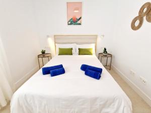 Postel nebo postele na pokoji v ubytování Deluxe Apartamento Masmar