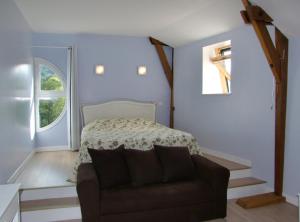 Posezení v ubytování Chambres d'Hotes du Moulin de Lachaux