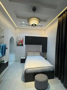 Voodi või voodid majutusasutuse Five Palms Studio Apartment toas
