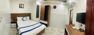 TV a/nebo společenská místnost v ubytování Hotel Trần Long