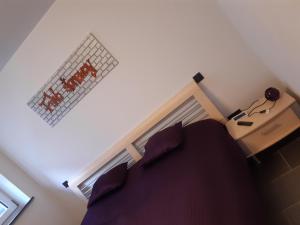Ein Bett oder Betten in einem Zimmer der Unterkunft FeWo-StoneWay
