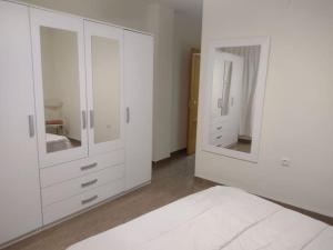 Ένα ή περισσότερα κρεβάτια σε δωμάτιο στο Apartamento en el centro de Jalance +2 φωτογραφίες