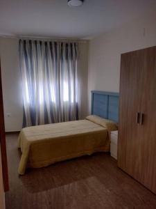 Ένα ή περισσότερα κρεβάτια σε δωμάτιο στο Apartamento en el centro de Jalance