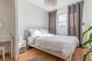 Voodi või voodid majutusasutuse Le calme et le confort des Sorbiers toas