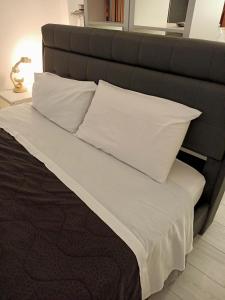 Posteľ alebo postele v izbe v ubytovaní Bologna House Pratello 5 + 37 fotografií