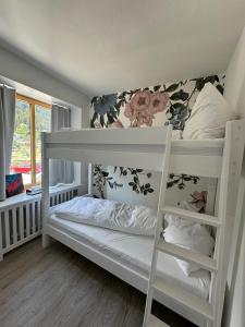 Postel nebo postele na pokoji v ubytování Hotel Buna luna by Seehof Laax