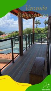 a balcony with a view of the ocean at Paraíso Olindense in Olinda