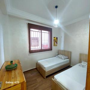 Katil atau katil-katil dalam bilik di superbe Appartement