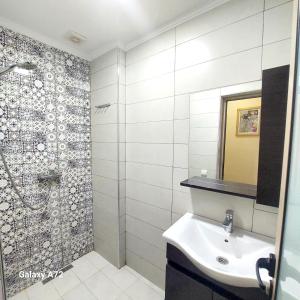 Bilik mandi di superbe Appartement