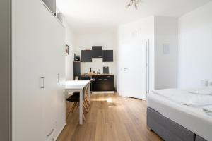 Postel nebo postele na pokoji v ubytování FarawayHomes Studios 43